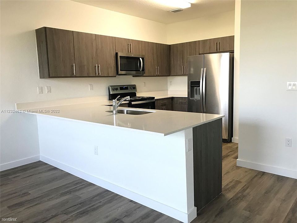 1st image of 15650 SW 136th St #104