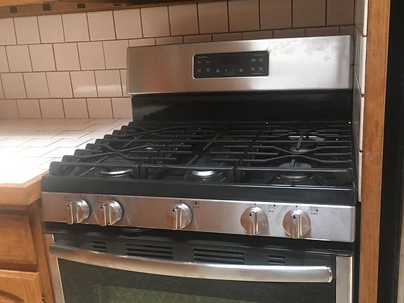 New 5 burner stainless stove