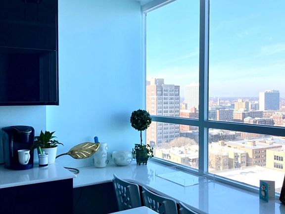 Chair height Quartz Countertop in kitchen with a view.