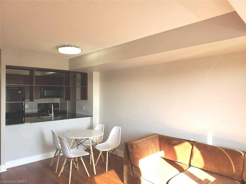 2nd image of 125 Village Green Sq #1806