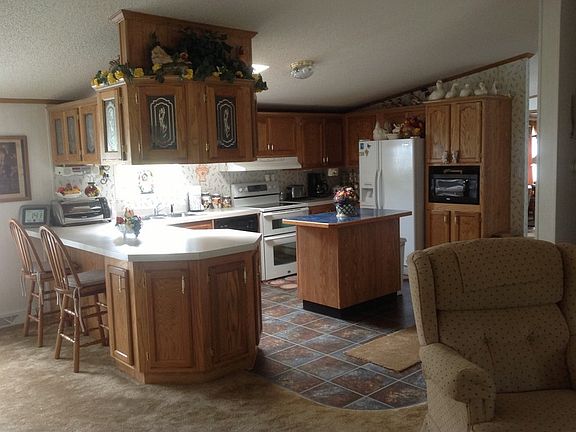kitchen
						:
						Spacious with island and newer linoleum.Lots of counterspace.