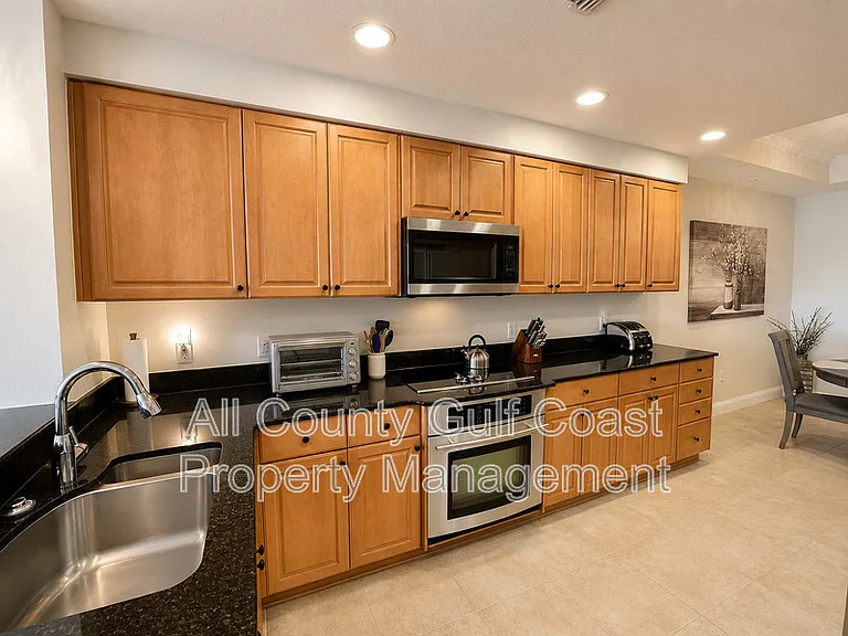 611 Riviera Dunes Way #207 — Photo 4