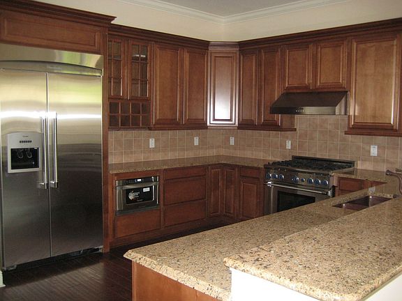 Chocolate glazed maple, Granite, Copper, Triple crown molding