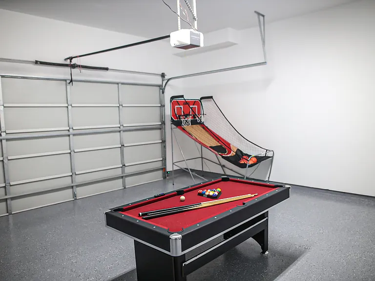 Basketball hoop and pool table in garage. Epoxy floors.
(CAN BE REMOVED FOR LEASE TERMS)