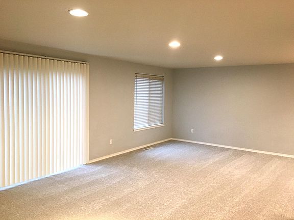 living room with plenty of natural light