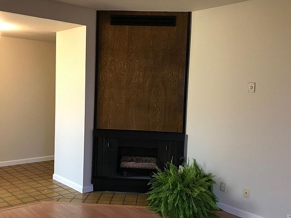 Family Room includes gas Fireplace with automatic starter button.