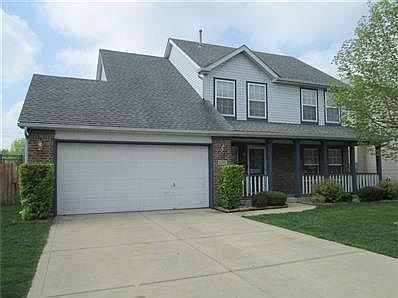 Nicely landscaped front of home.