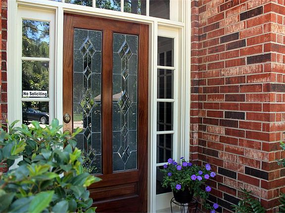 GREAT CURB APPEAL WITH FULL LANDSCAPED YARD AND MATURE TREES.