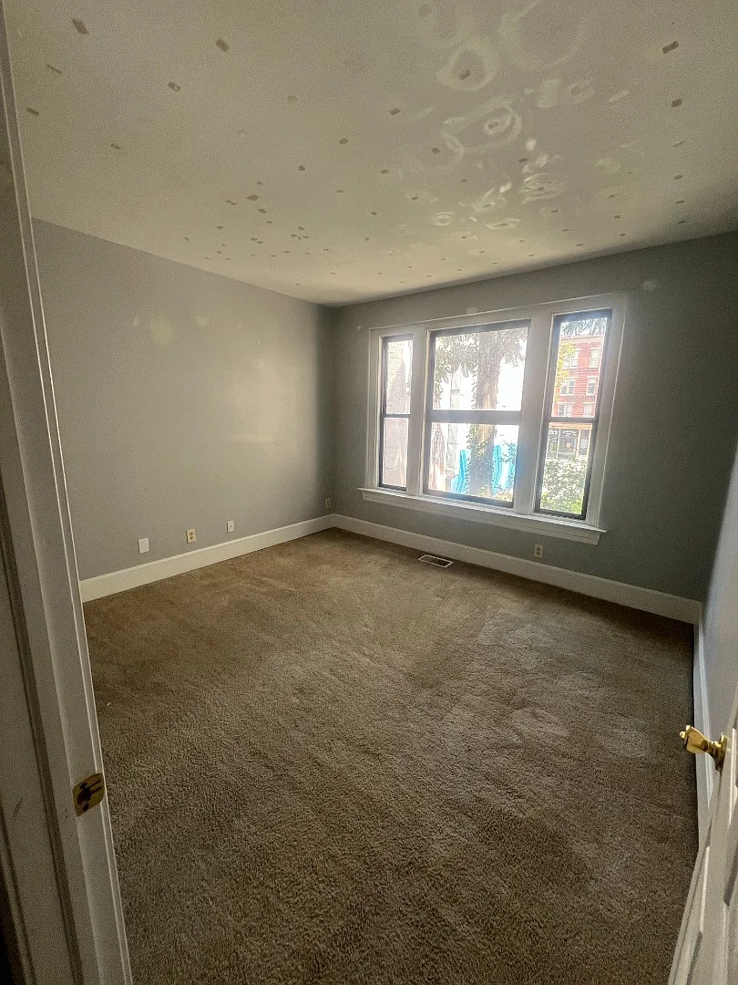 Downtown Charm Meets Modern Convenience Spacious 2-Bed with Parking Pass Included! — Photo 4