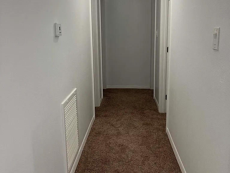 Hallway between bedrooms and living room
