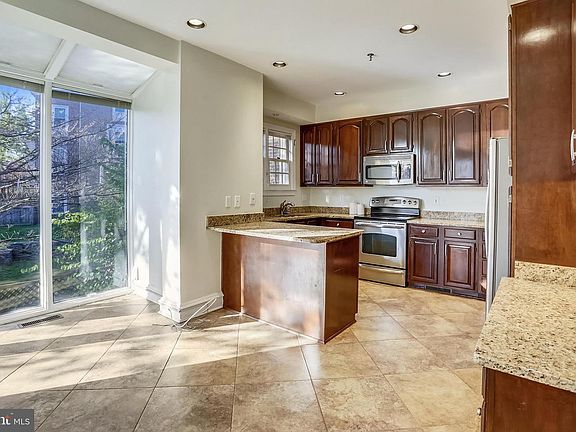 4th image of 5459 Whitley Park Terrace Townhouse #1