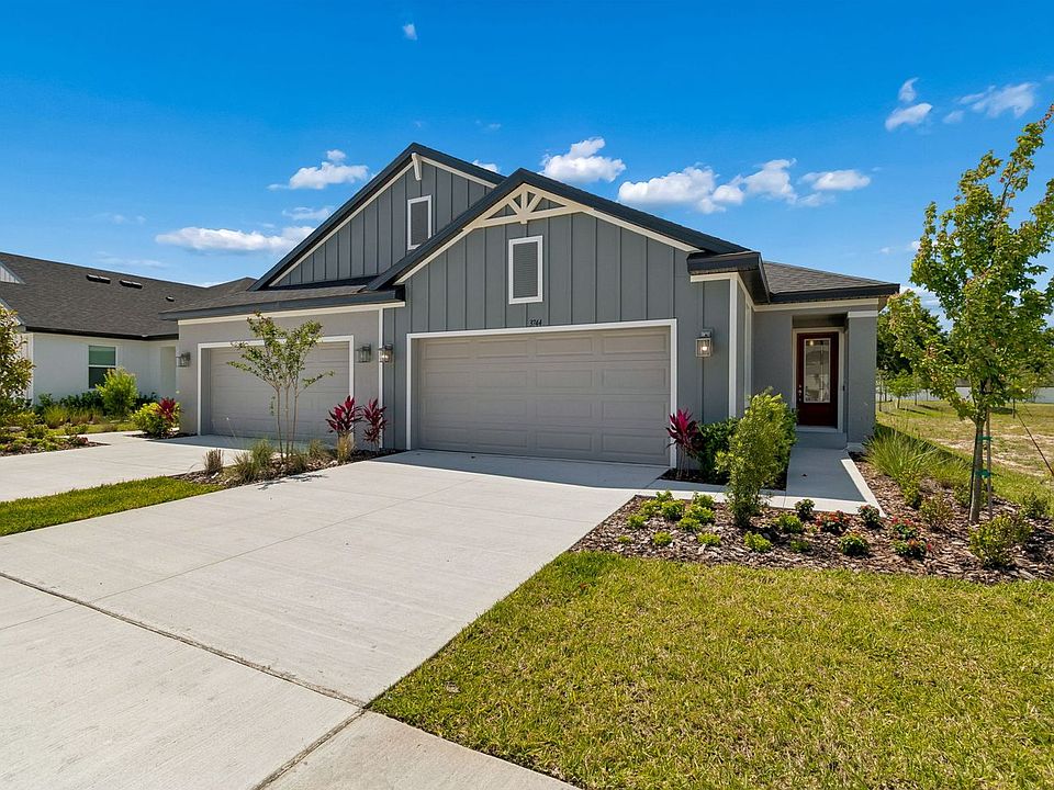 Sandpiper new construction luxury paired villa home plan in Sun City Center, FL at Fairway Pointe by