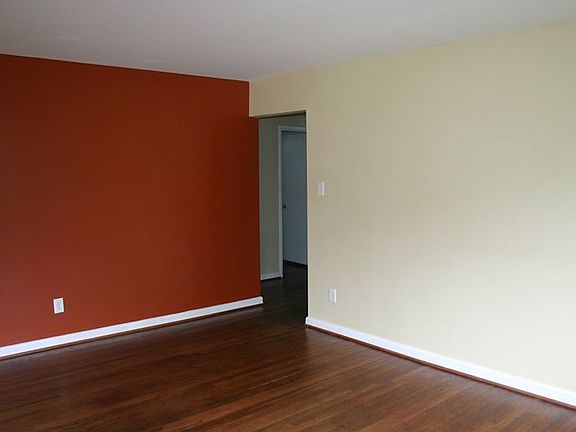 Hallway leads to 3 bedrooms