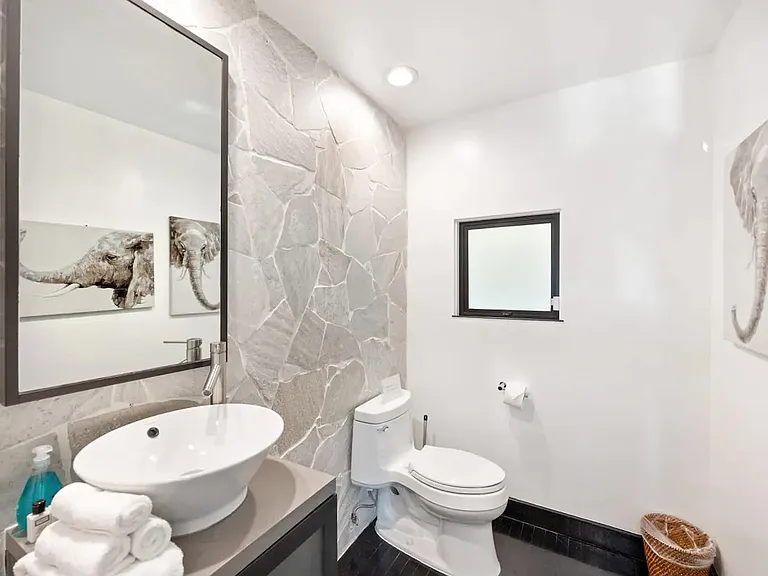 Indulge in luxury with our stylish, minimalist bathrooms, complete with high-end fixtures, plush towels, and premium toiletries.