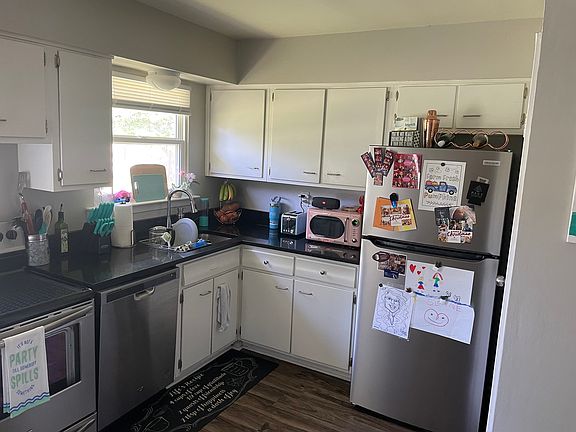 Kitchen with staineless steel appliances and granite