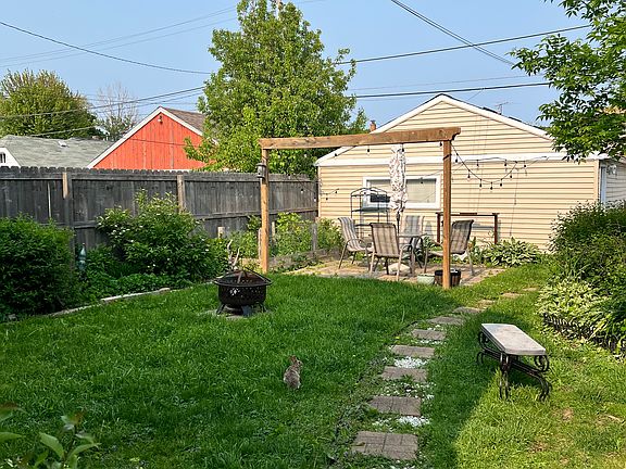 Backyard patio and garage, view from house side door.