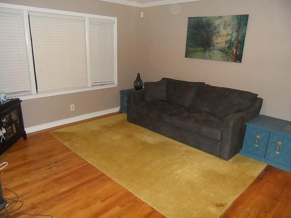 Living room with current paint color and new blinds