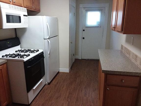 Kitchen with entrance to back balcony