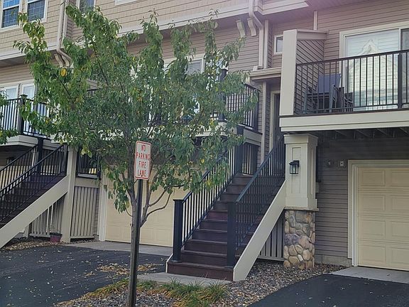 Street view of stairs leading to the house.