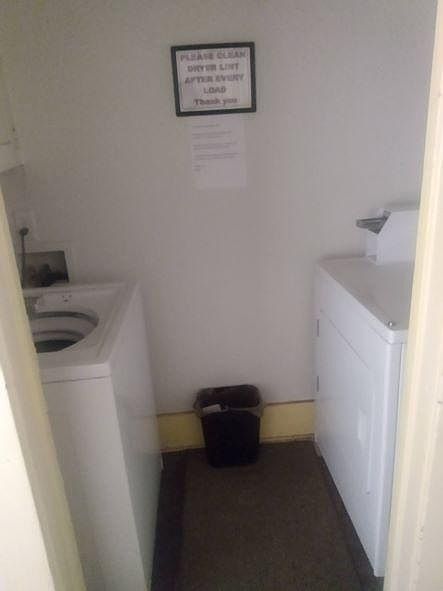 Laundry room at end of hallway for all tenants use