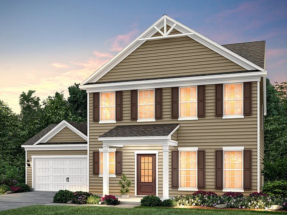 Foxfield Exterior 1 w siding, front porch and 2 car garage