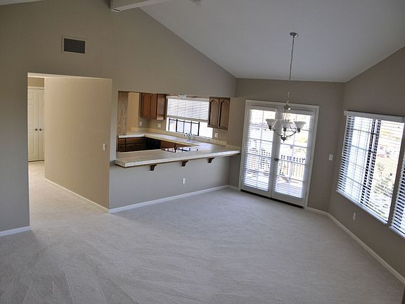 Living room with vaulted ceilings