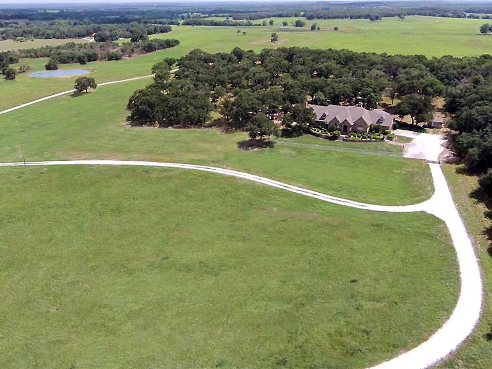 ELEVATED VIEW OF HOME & LAND