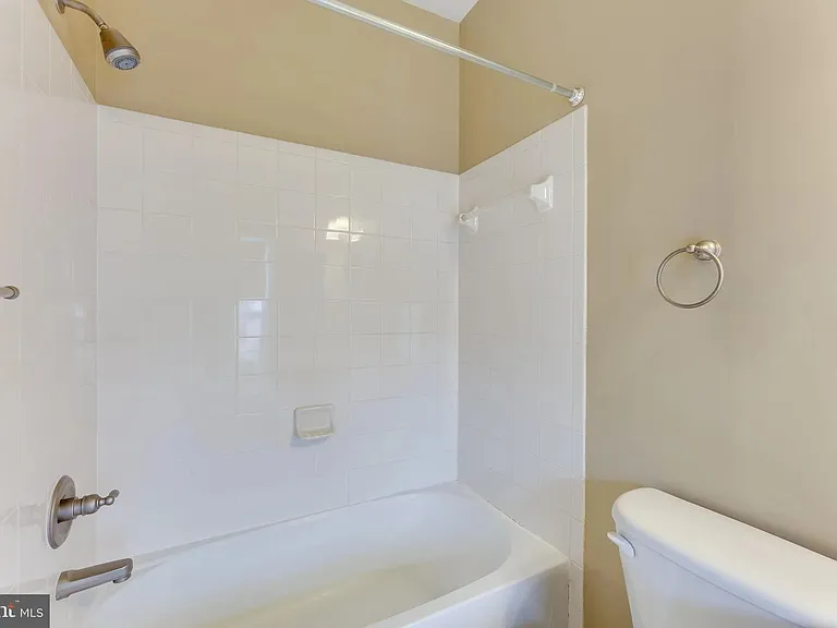 3rd Bathroom Upstairs, new marble polished tile flooring