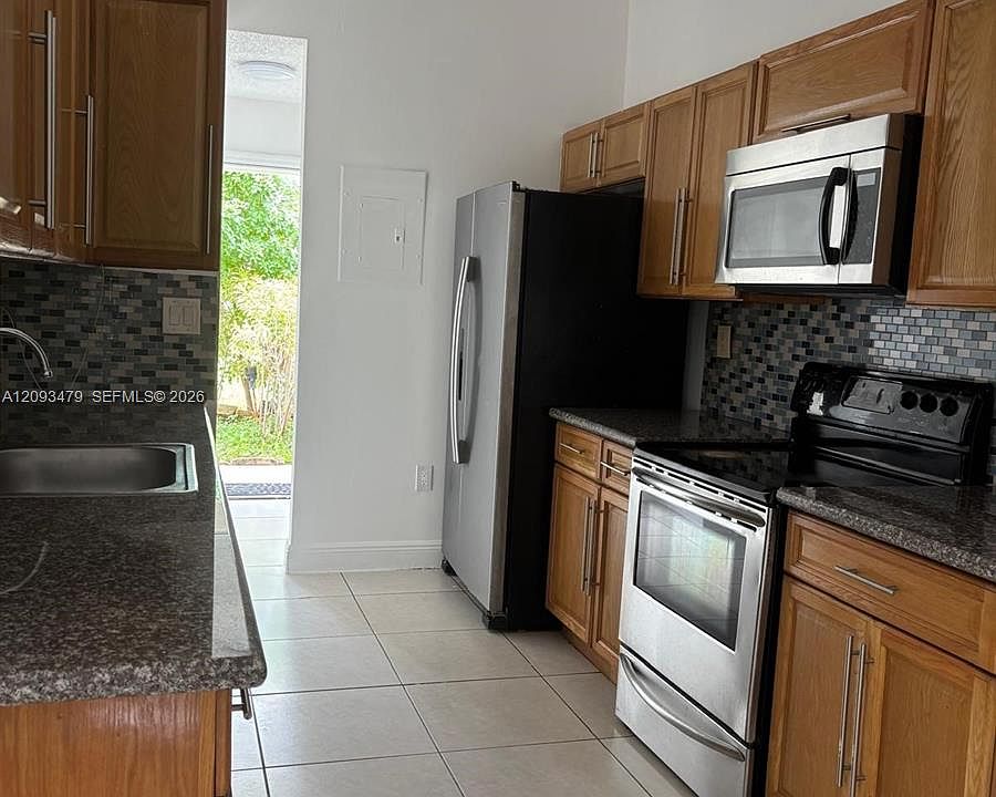 1st image of 815 NE 213th Ter APT 4