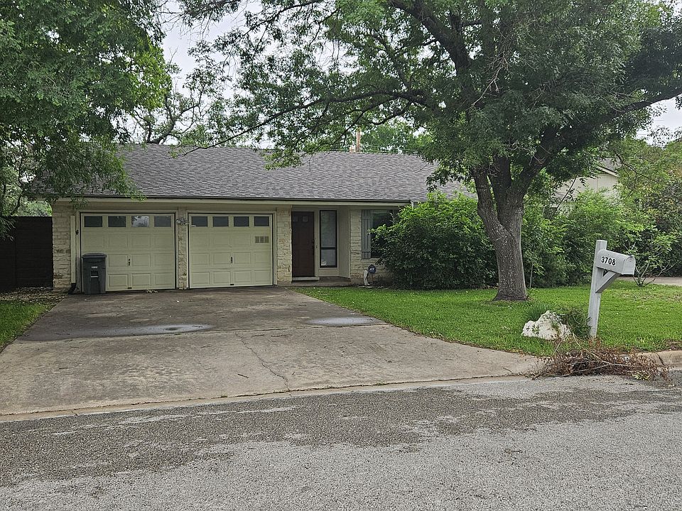 Two car garage facing a quiet street.
