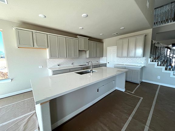 Construction progress - kitchen with large center island and walk in pantry