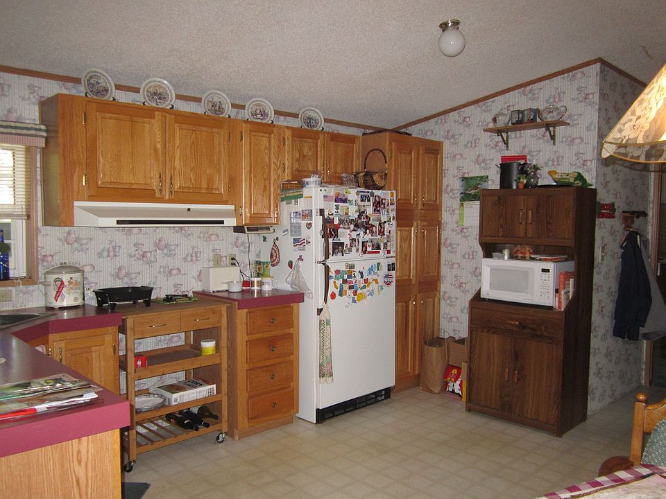 2nd image of 10450-6 Mile Rd Lot 87