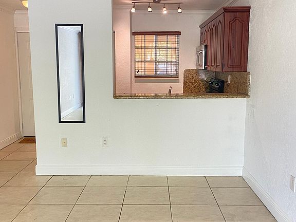 5th image of 300 Madeira Ave APT 103