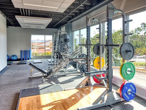 New 8,000 sq ft fitness center featuring iron grip free weights