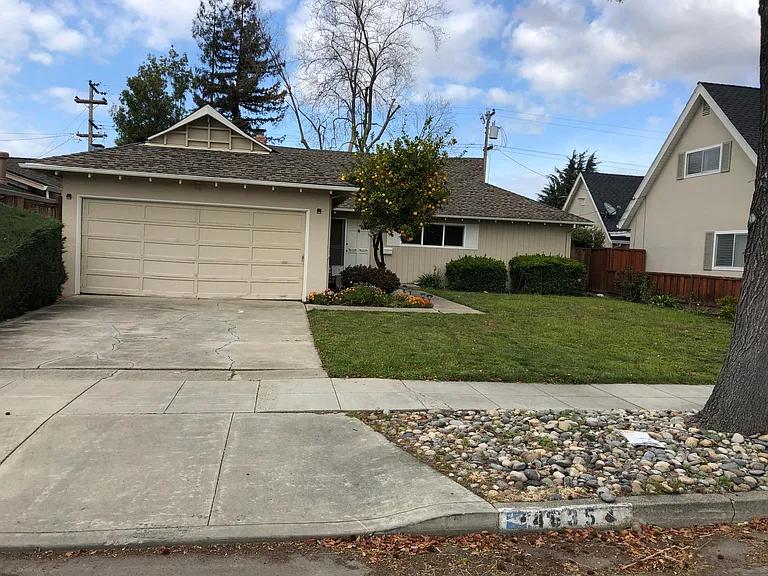 Garage Entry (old driveway and garage door).