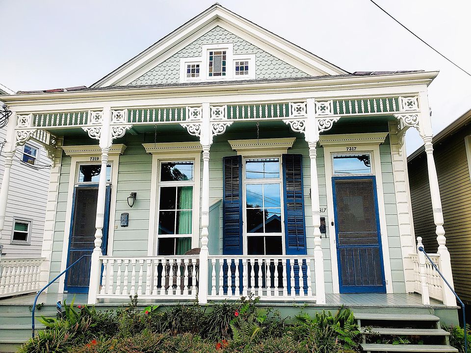 Front of house Apartment is to the right of the picture