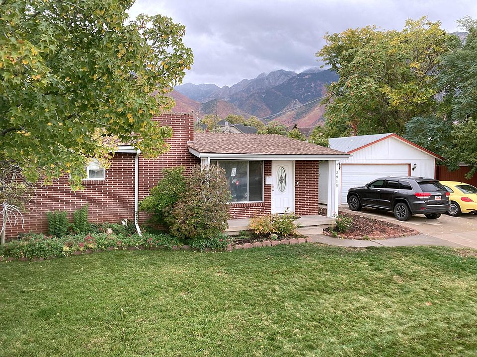 Front of house. The front door, driveway, and garage are for the upstairs tenant.