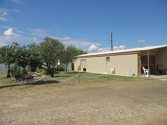 Side lot with shade trees
