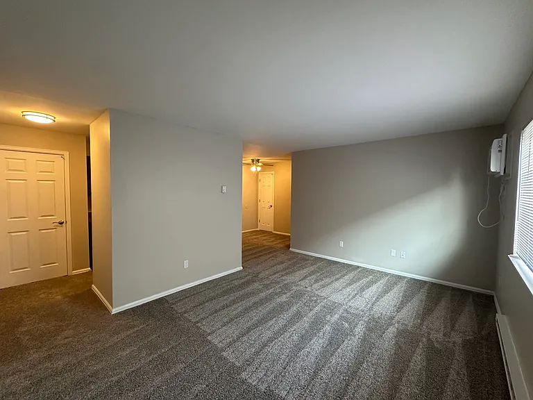 Two Bedroom Renovated- Spacious Living Room (Entry Closet to the left, and Separate Dining Area off to the right)