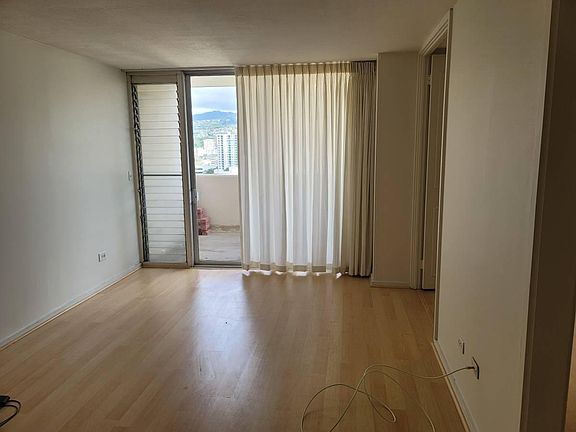 Clean and well maintained wood laminate flooring. Newly painted with new drapes!