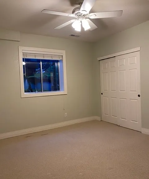 Spacious bedroom with 8 ft ceilings