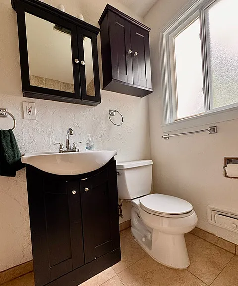 Bath. Fresh paint and grout in shower