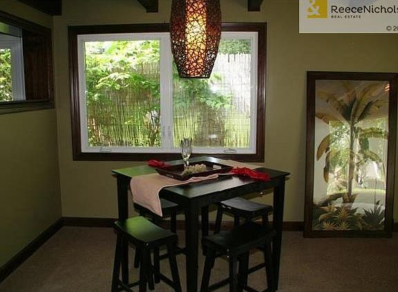 All windows have been updated.  Ceiling in great room and dining have wood beams and bamboo.  Very open and spacious dining.