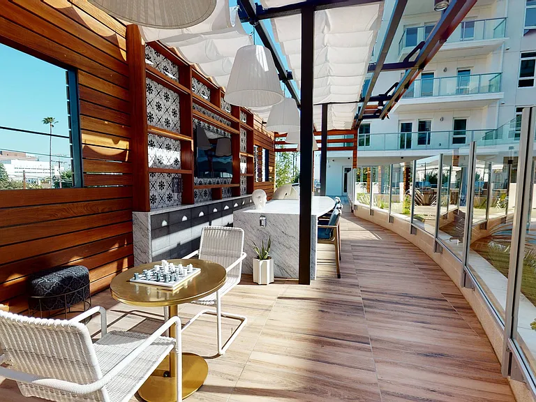Outdoor kitchen and entertainment poolside
