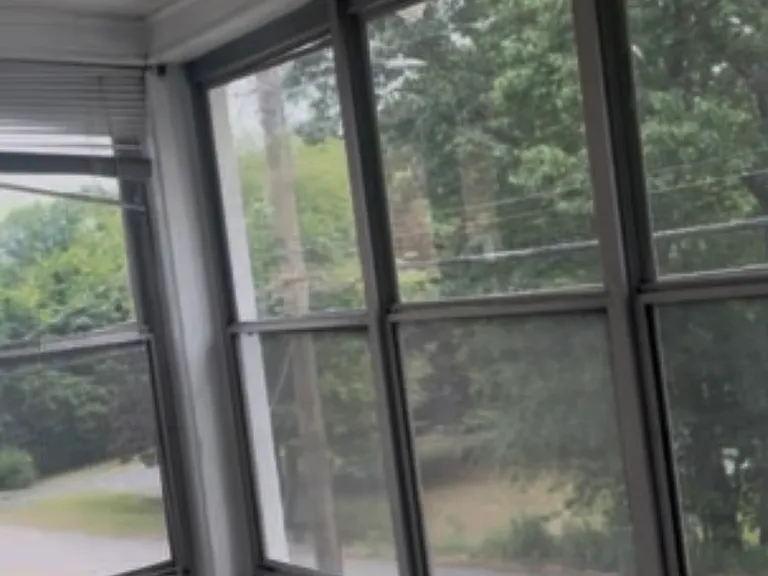 Three season porch off of primary bedroom