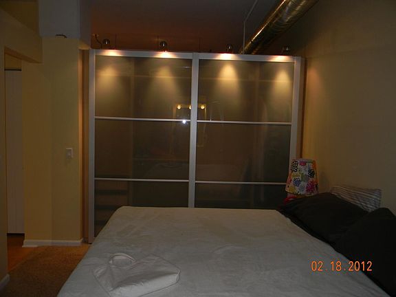 Built in closet, drawers and king memory foam bed