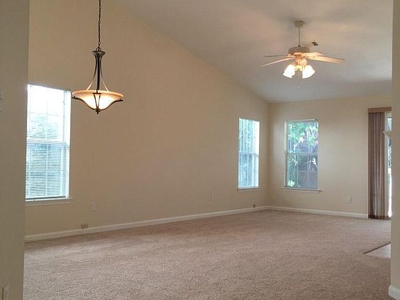 New wood-look vinyl plank flooring replacing carpet.