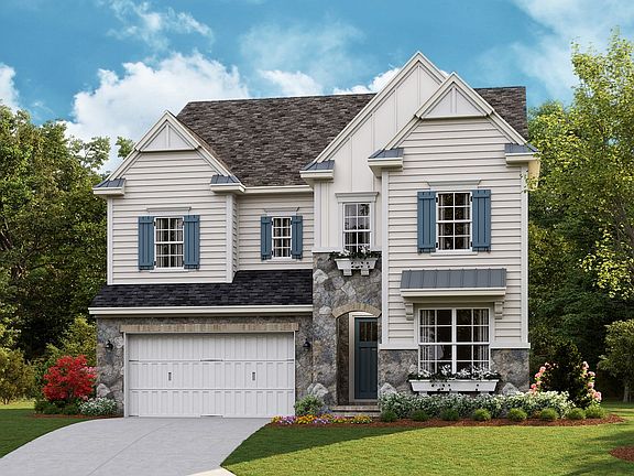 Coronado A - American Cottage 2-Car Front Load Garage Note Renderings may show optional feature