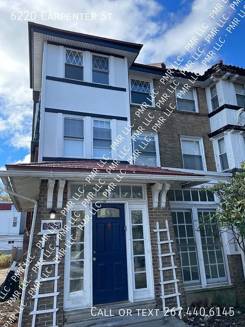 Spacious 5-Bedroom Cobbs Creek Townhome with Garage and Driveway — Photo 1