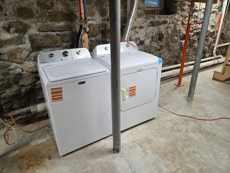 New washer and dryer in basement plus approx. 100 square feet of additional tenant storage.